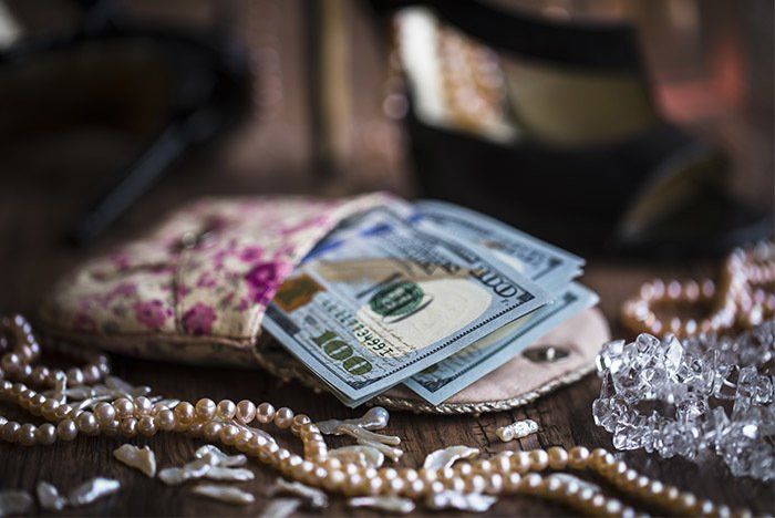 Sell My Items — Money Surrounded by Jewelry in Reno, NV