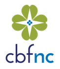 A green four-leaf clover icon with a small blue cross, above the dark blue and light blue text 