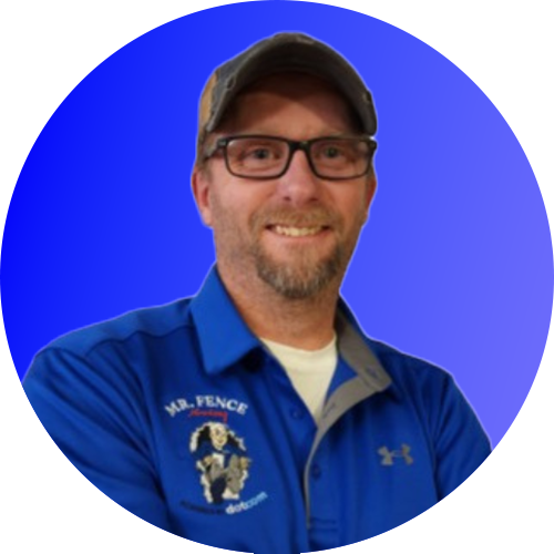 A man wearing glasses and a blue shirt that says mr. fence