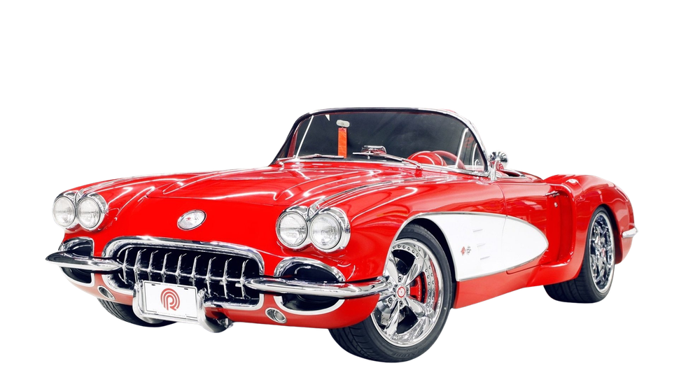 Red vintage sports car with chrome details on a white background