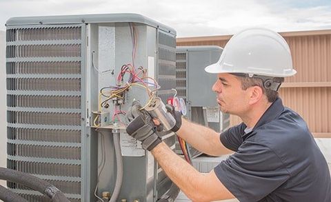 Technician and Capacitor — Heating Repair Service in Paso Robles, CA