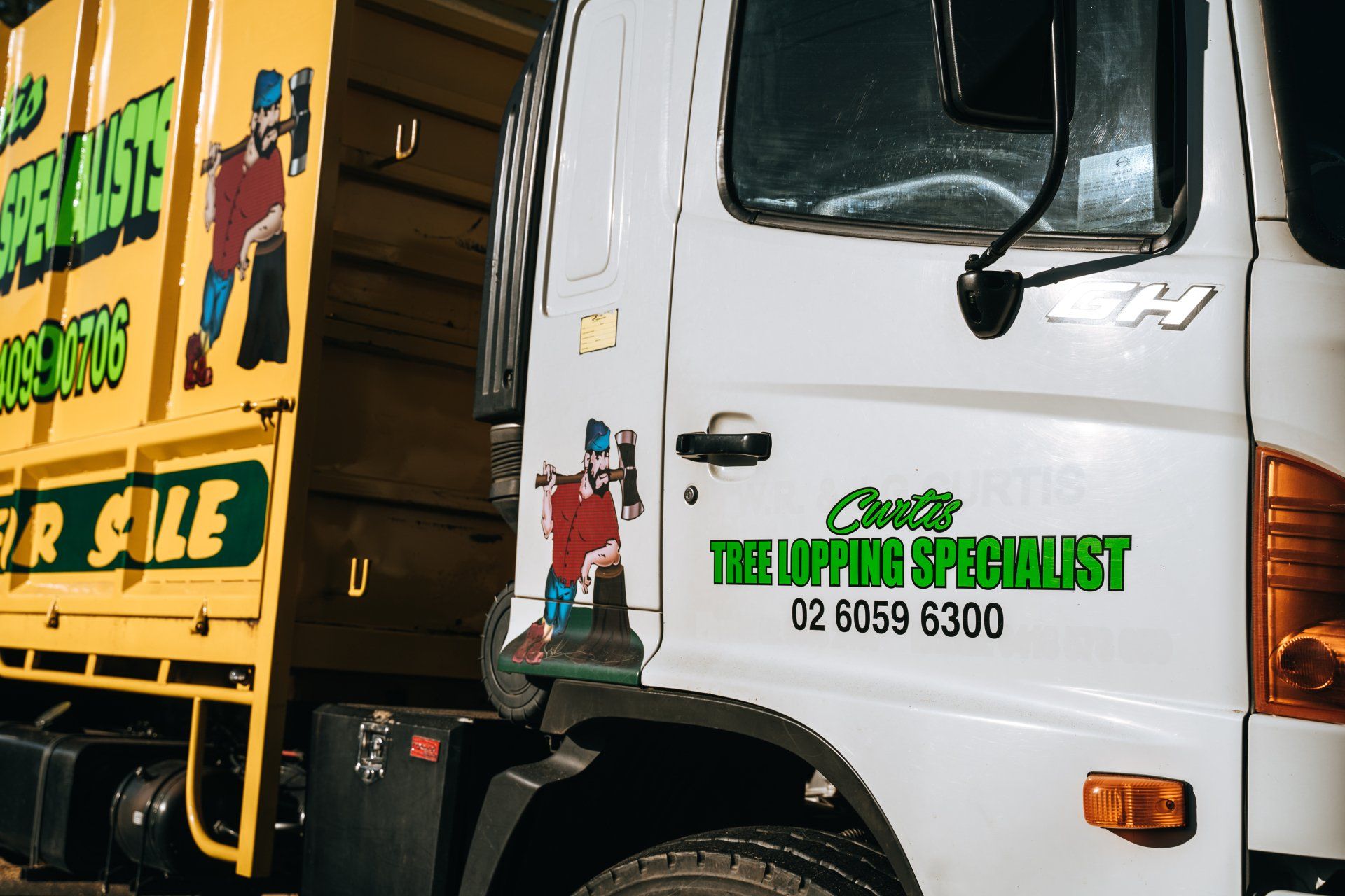 A white truck with the hippie specialist written on the side