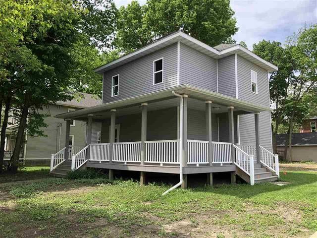 Gray house with wrap-around porch
