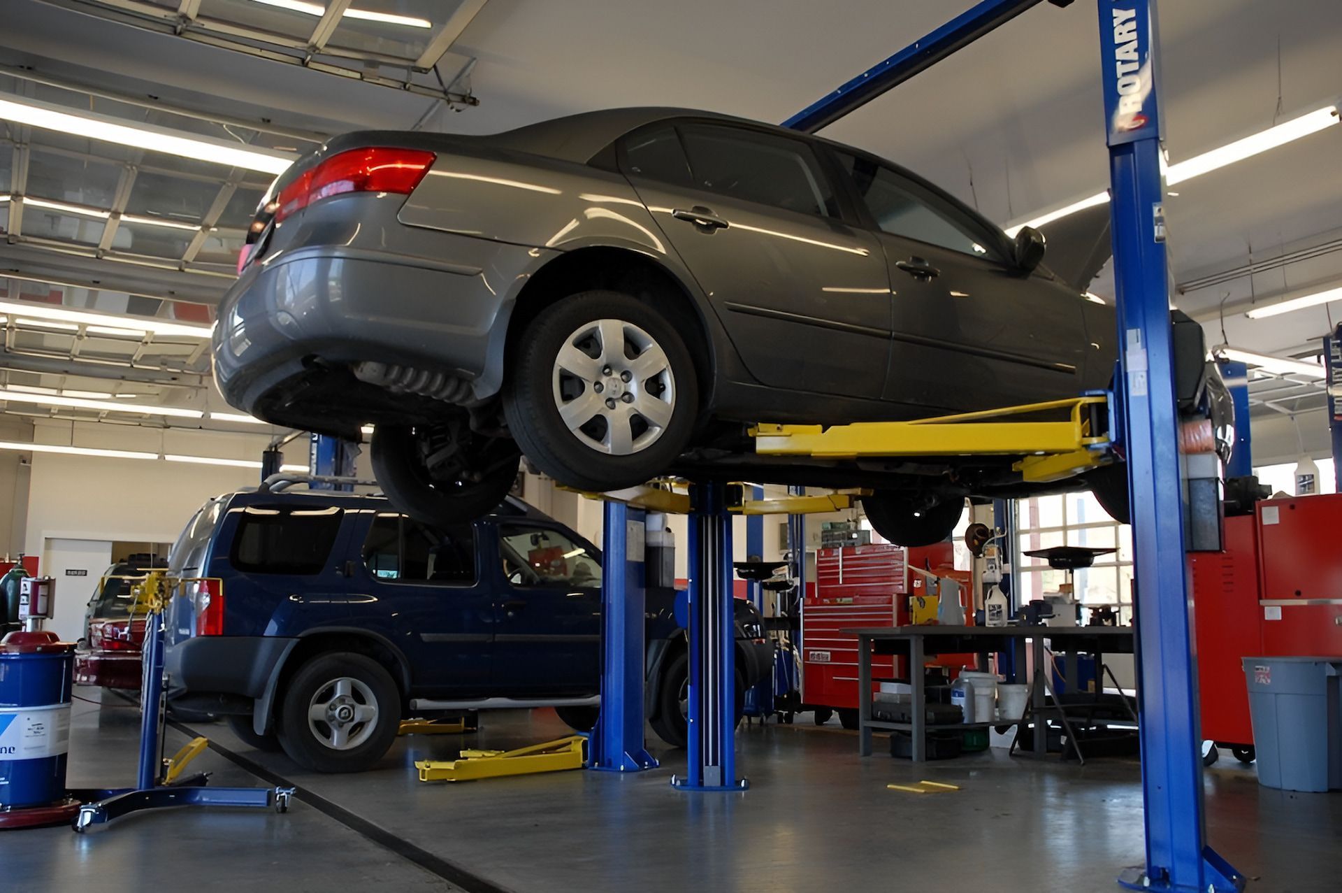 A Room Filled With Lots Of Speakers And Boxes — Bones Tyres in Armidale, NSW
