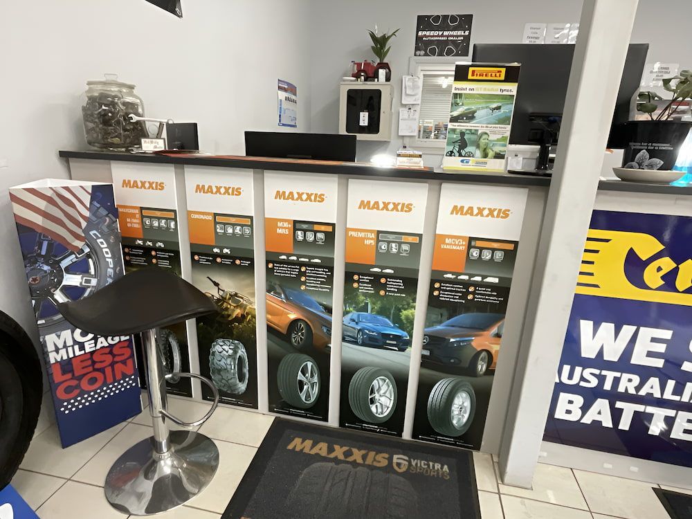 A Showroom With A Counter And A Stool — Bones Tyres in Armidale, NSW
