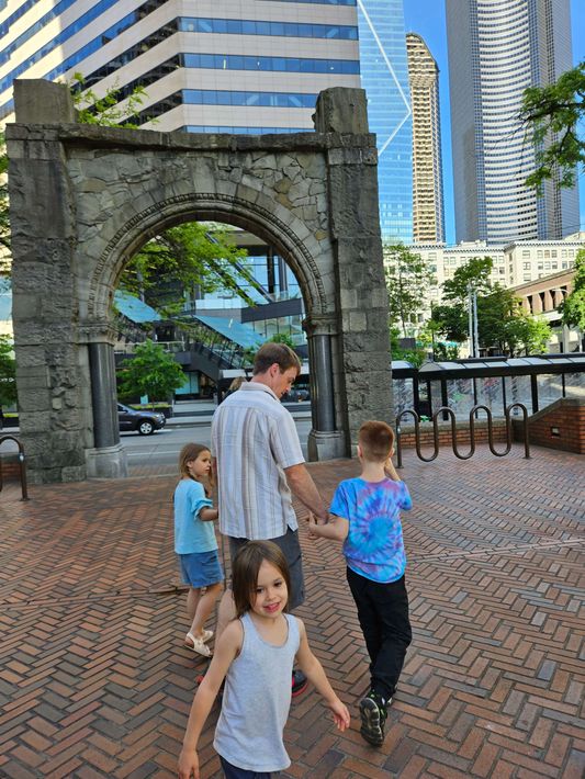 Travis and kids walking in Seattle