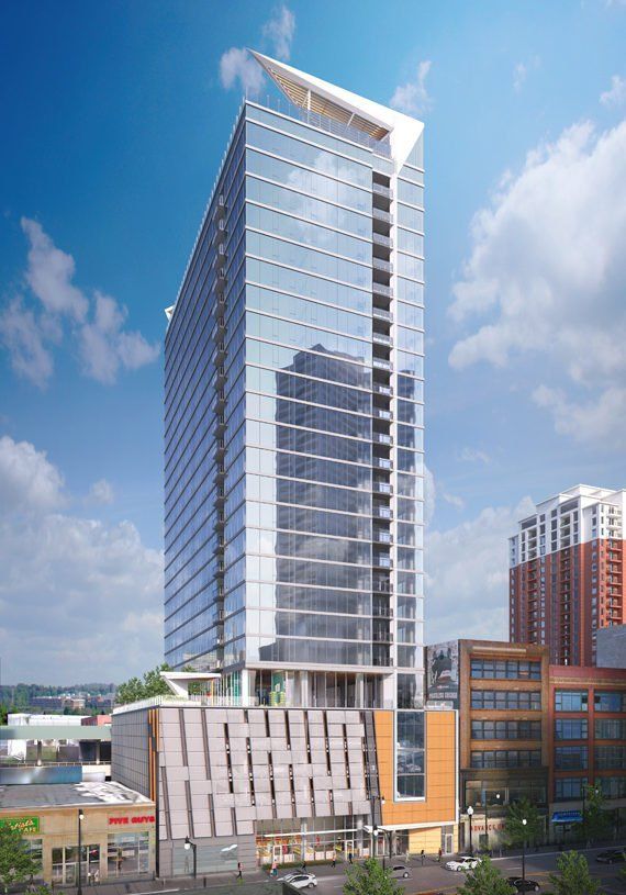 An artist 's impression of a tall building in a city