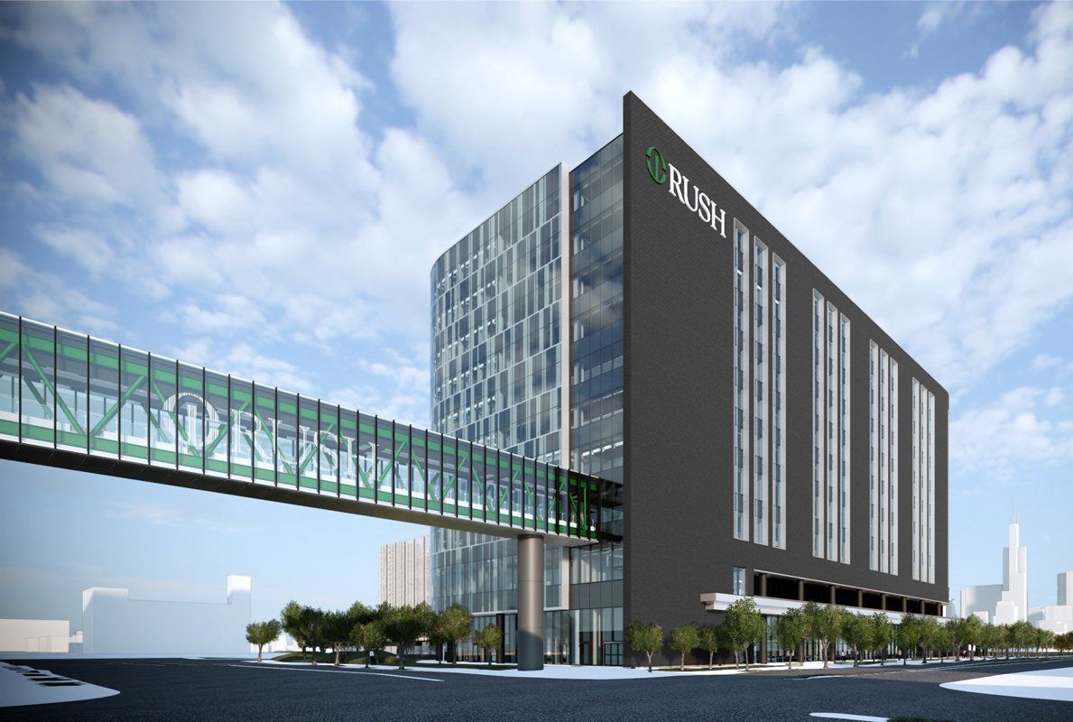 An artist 's impression of a large building with a bridge leading to it