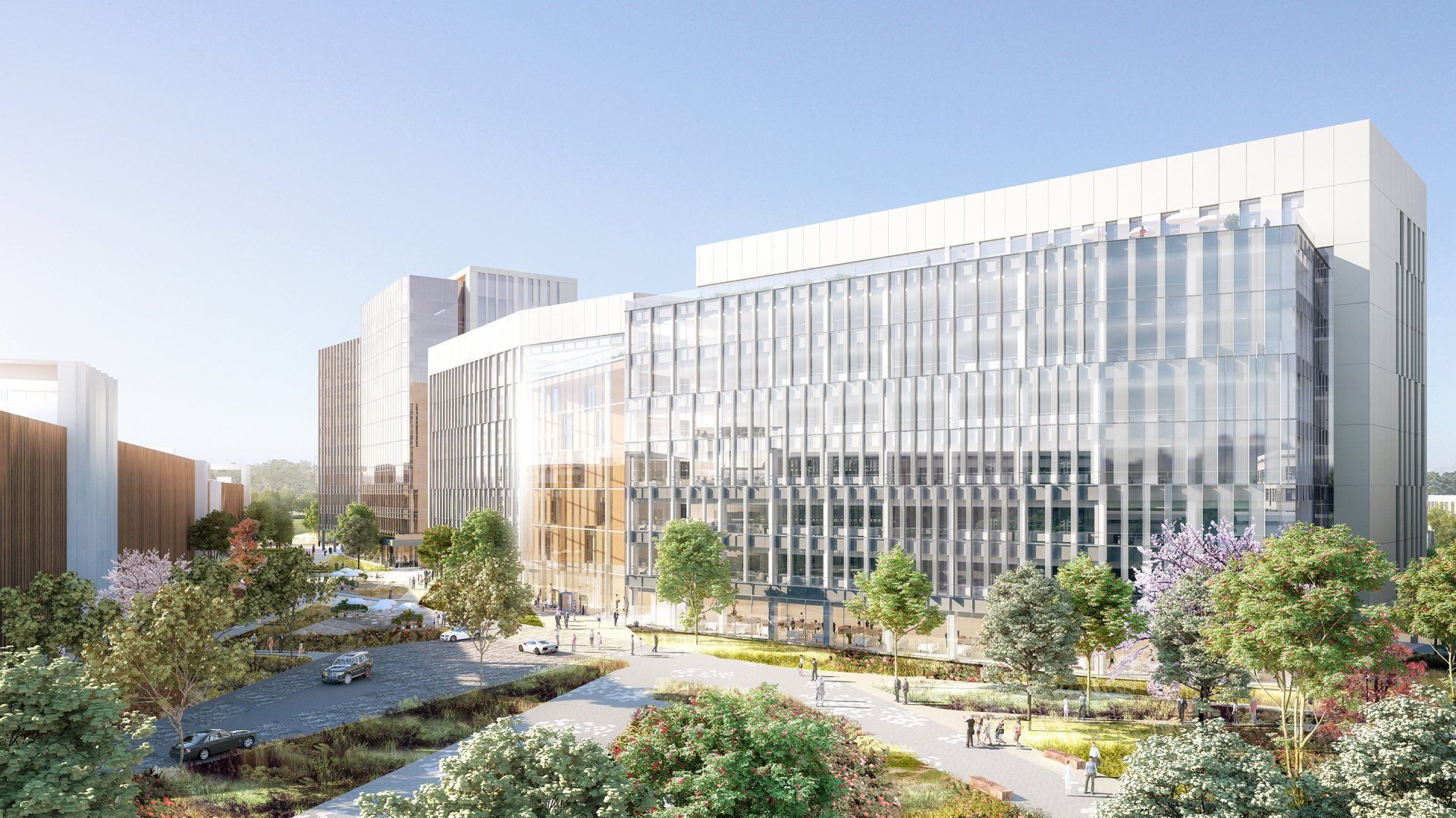 An artist 's impression of a large building with lots of windows surrounded by trees.