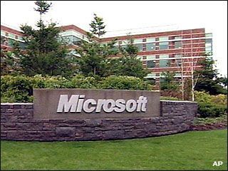 A microsoft sign in front of a large building