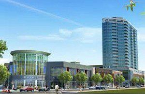 An artist 's impression of a large building with a lot of windows.