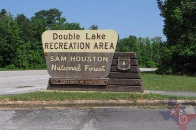 A sign for double lake recreation area in sam houston national forest