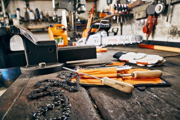 Woodworking tools on a workshop bench with wood shavings and hand tools in the foreground  — Stihl Shop Atherton In Atherton, QLD