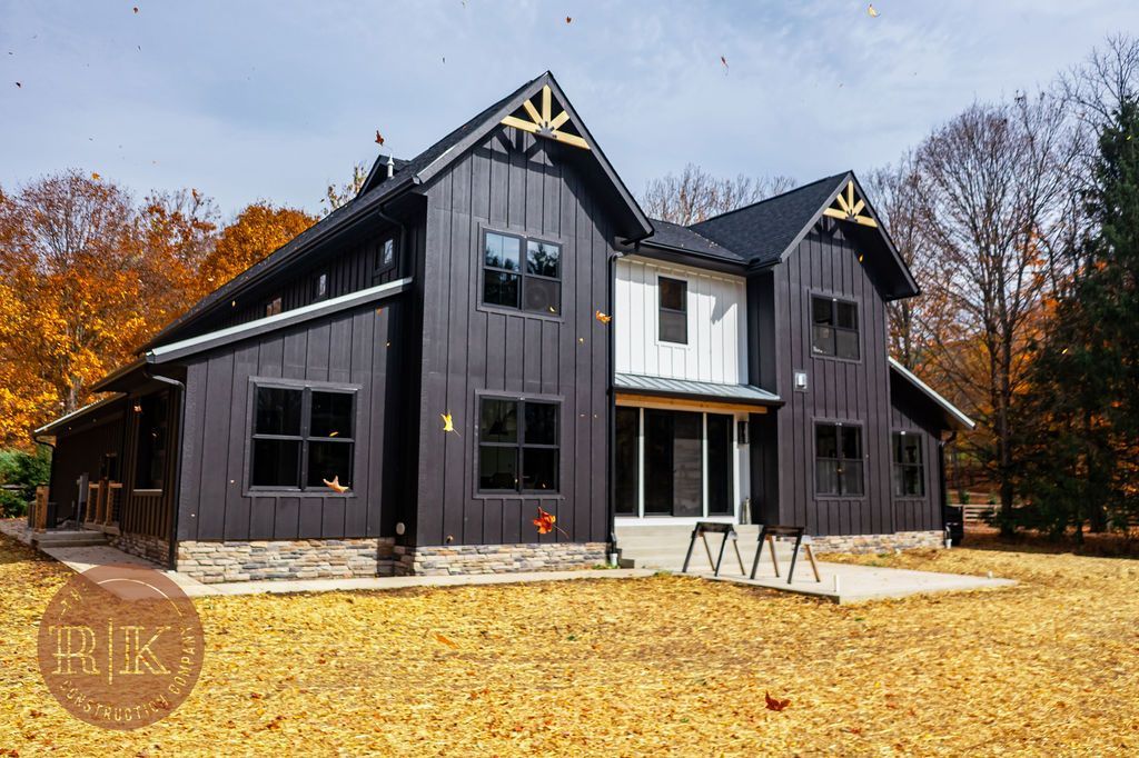 Black board and batten siding on custom home in Granville Oh