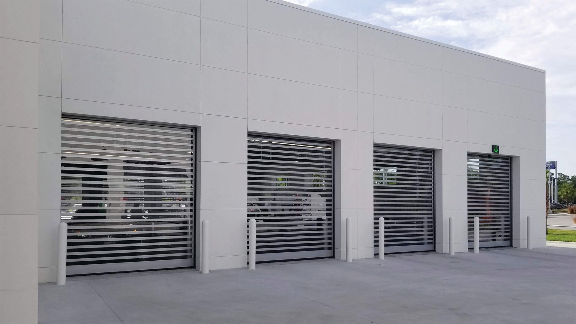 There is a door in the wall of a building.