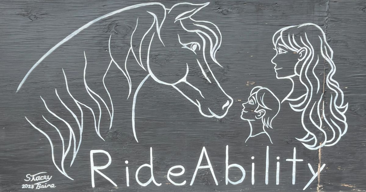 Chalk drawing: horse, two people looking up at it. 