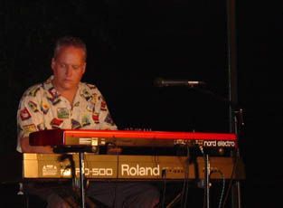 Keyboardist playing two keyboards, 