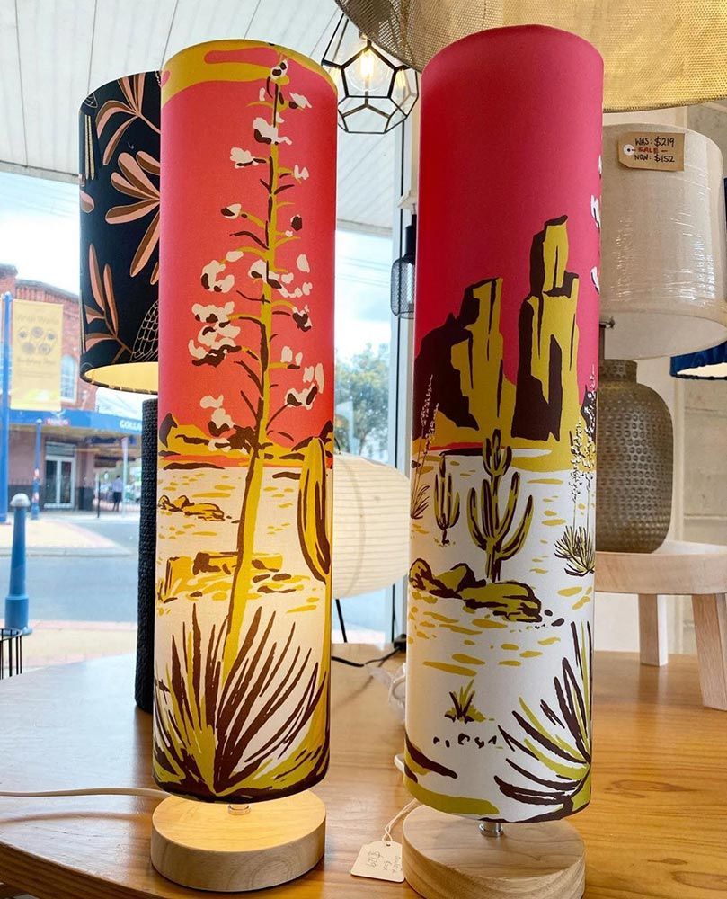 Two Desert-themed Cylindrical Lamps With Bright Pink Tops — Brightway Lighting in Lismore, NSW