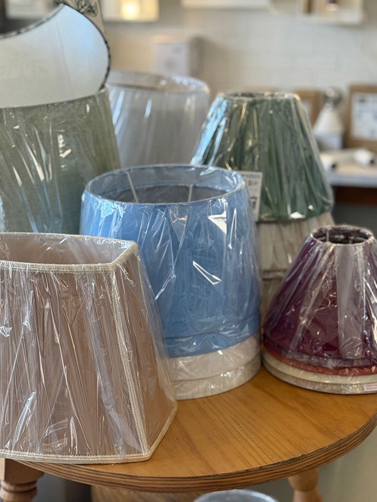 Assorted Lamp Shades In Protective Plastic Wrap — Brightway Lighting in Lismore, NSW