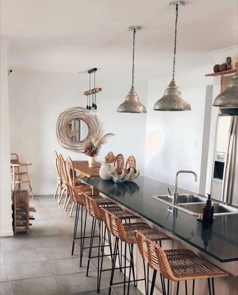 A Clear Glass Pendant Light is Hanging From the Ceiling — Brightway Lighting in Lismore, NSW