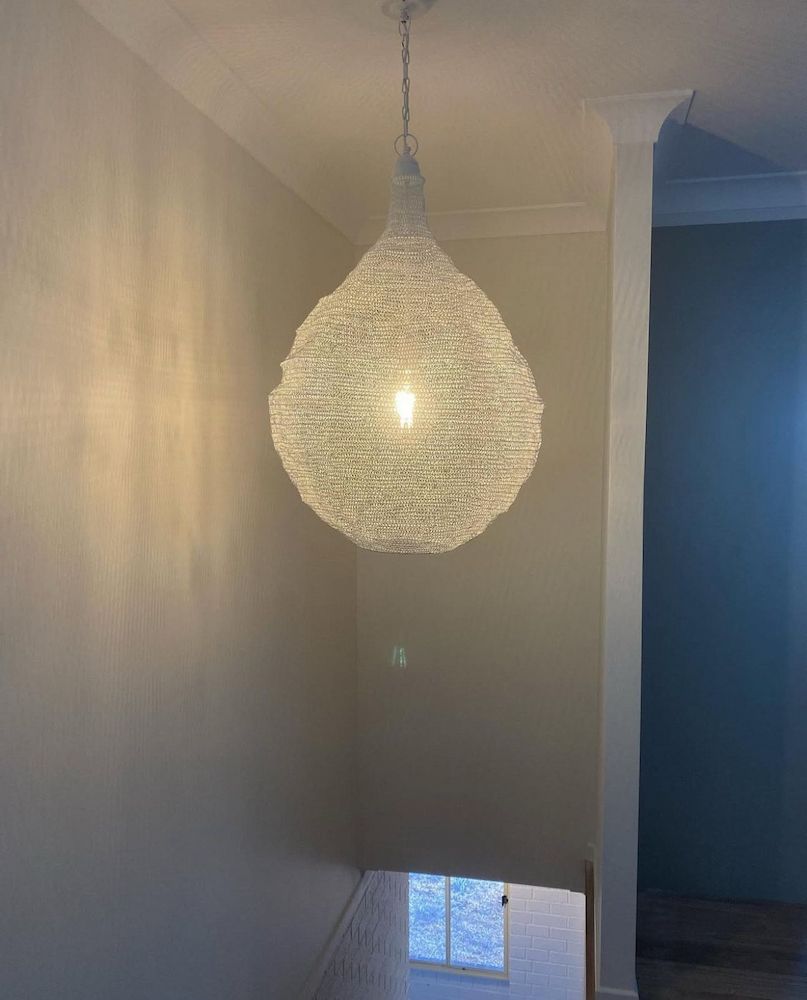Tear-drop Shaped White Light Fixture Hangs From the Ceiling — Brightway Lighting in Lismore, NSW
