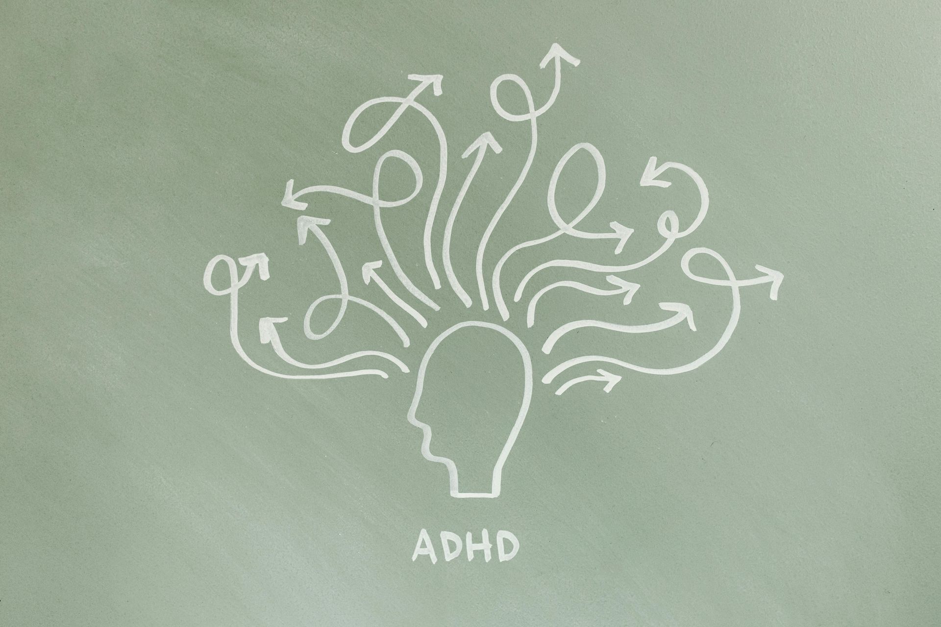 A drawing of a head with arrows coming out of it.