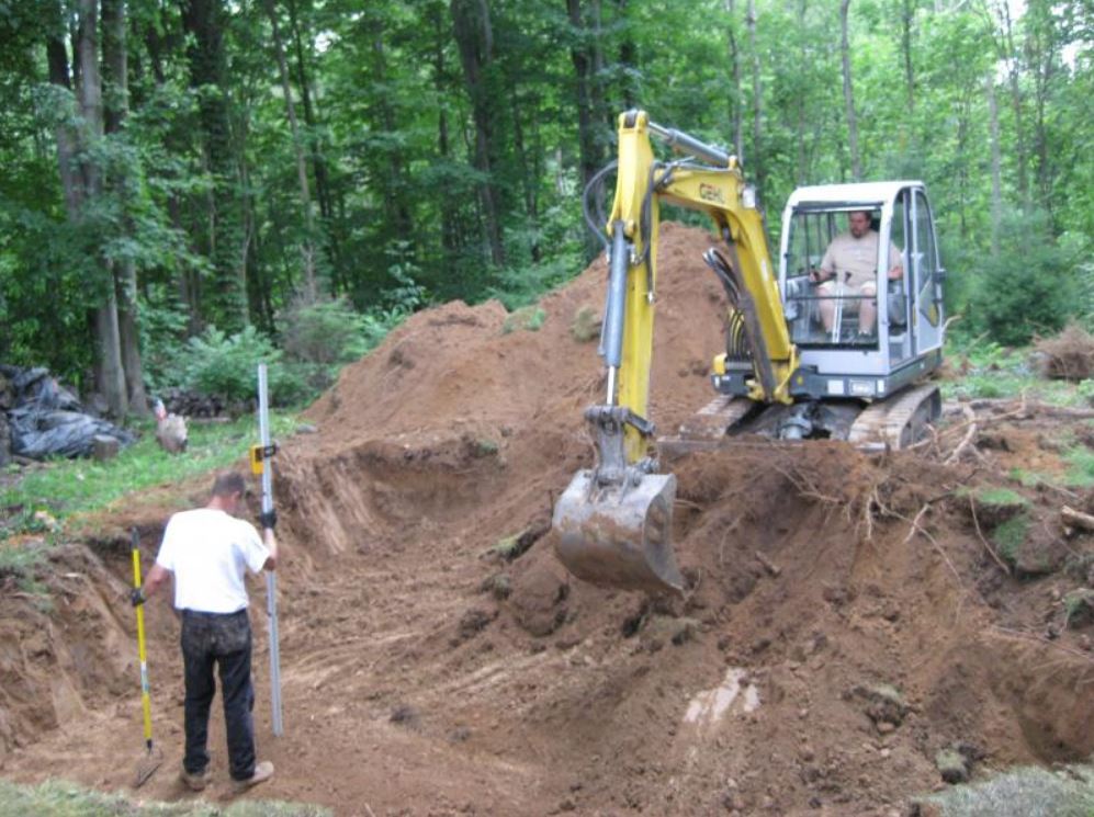 Excavator Digging On The Backyard — Liverpool, NY — CoolWaters Pool & Spa