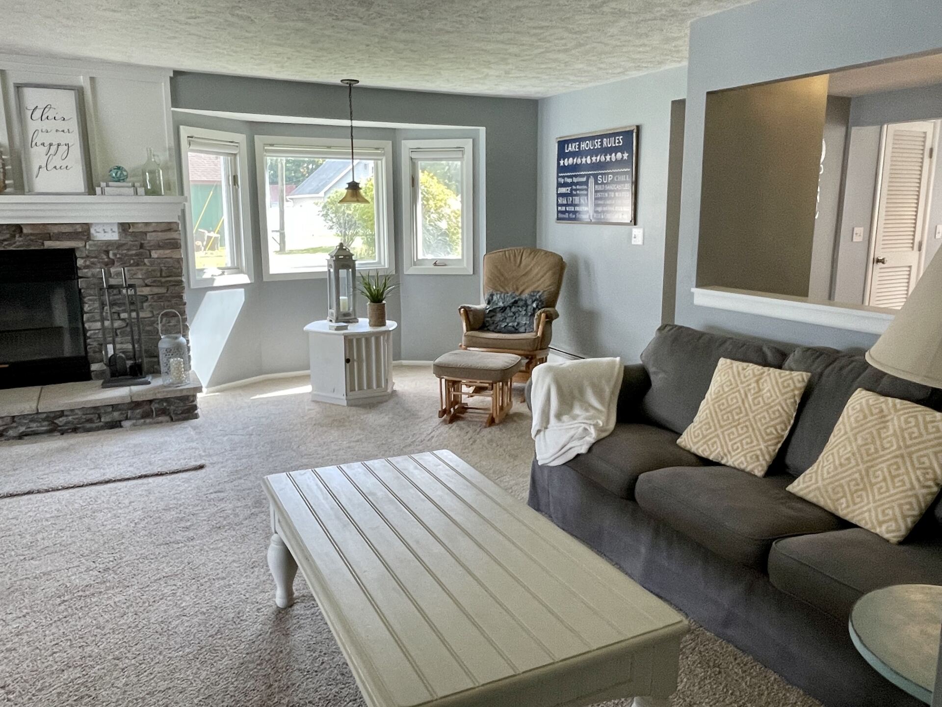 A living room with a couch and a coffee table