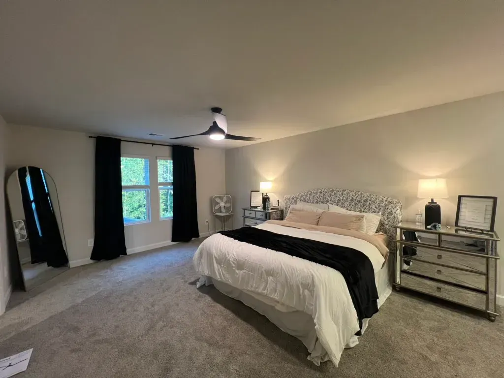 There is a large bed in the middle of the room.