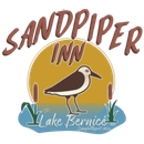 A logo for sandpiper inn lake bernice with a bird