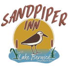 A logo for sandpiper inn lake bernice with a bird