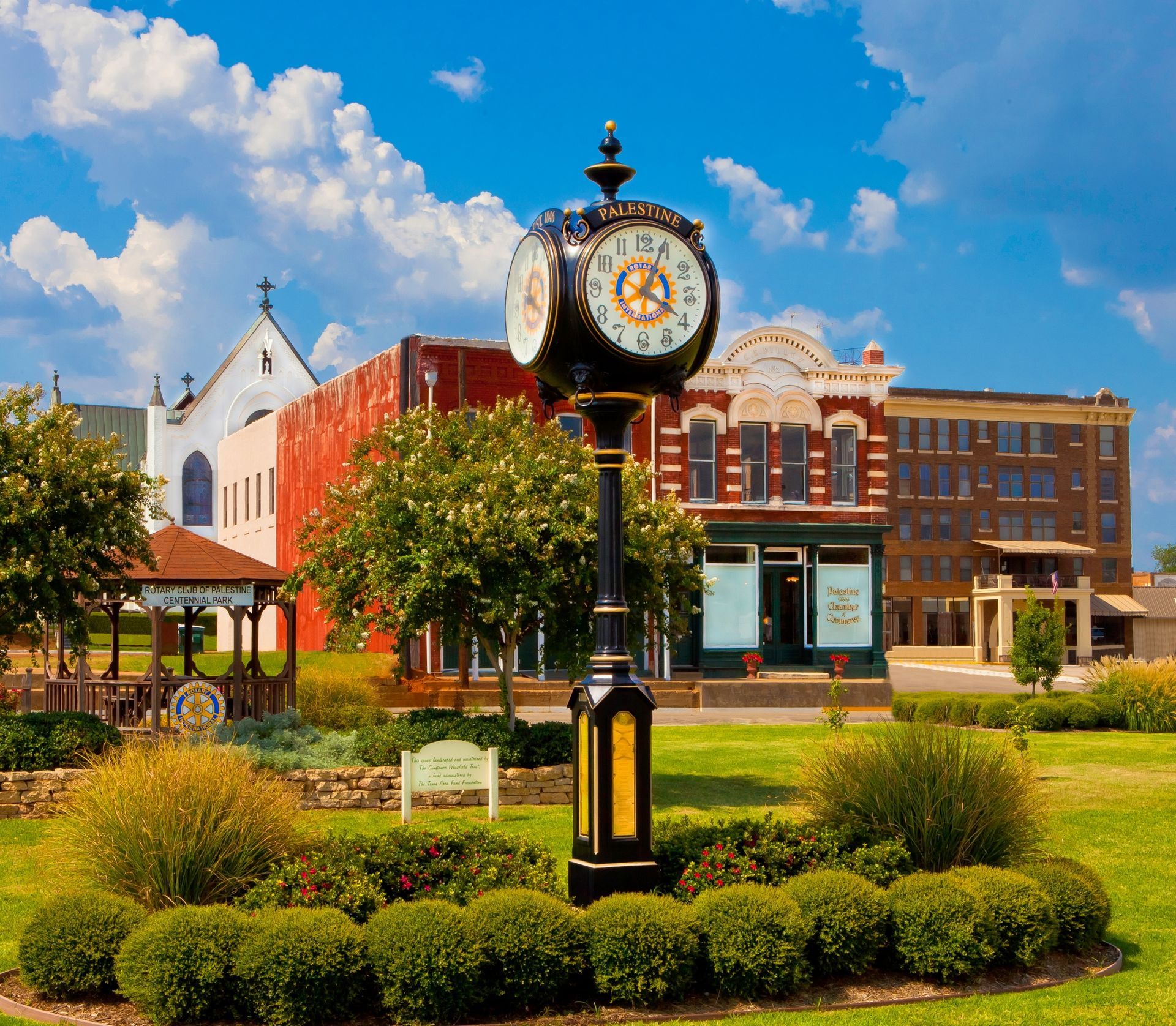 A white van with the number 2151 on the side is parked on the side of the road