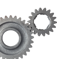 Two interlocking metal gears, one large and one small. | Driver's Choice