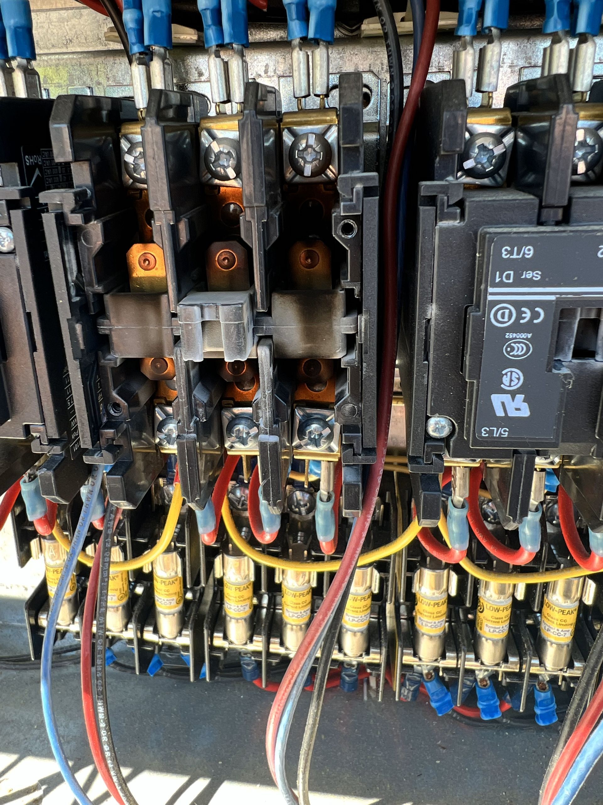 A bunch of wires are connected to a electrical device