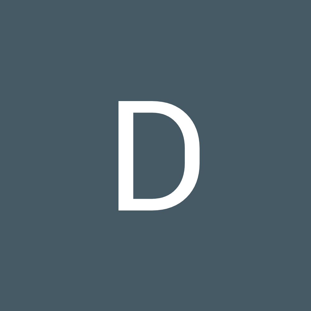White letter D on a slate-blue background.