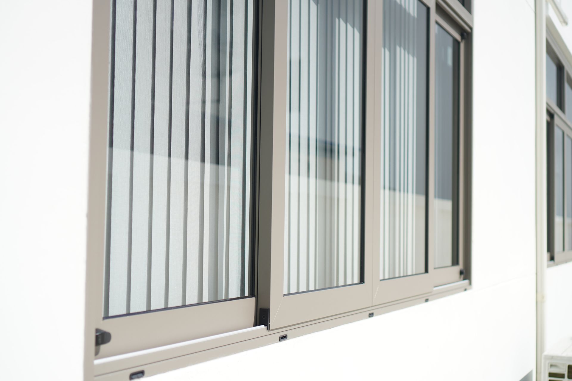 Aluminum frame sliding window. 