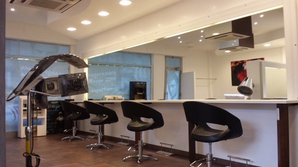 Controsoffitto per negozio di parrucchiera