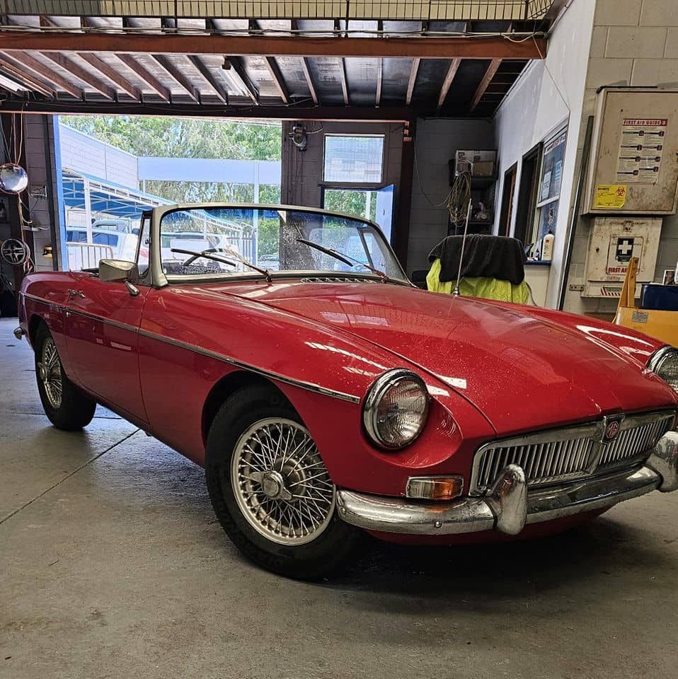A Red Sports Car Is Parked In A Garage — Advanced Darwin Diesel Service In Darwin City, NT