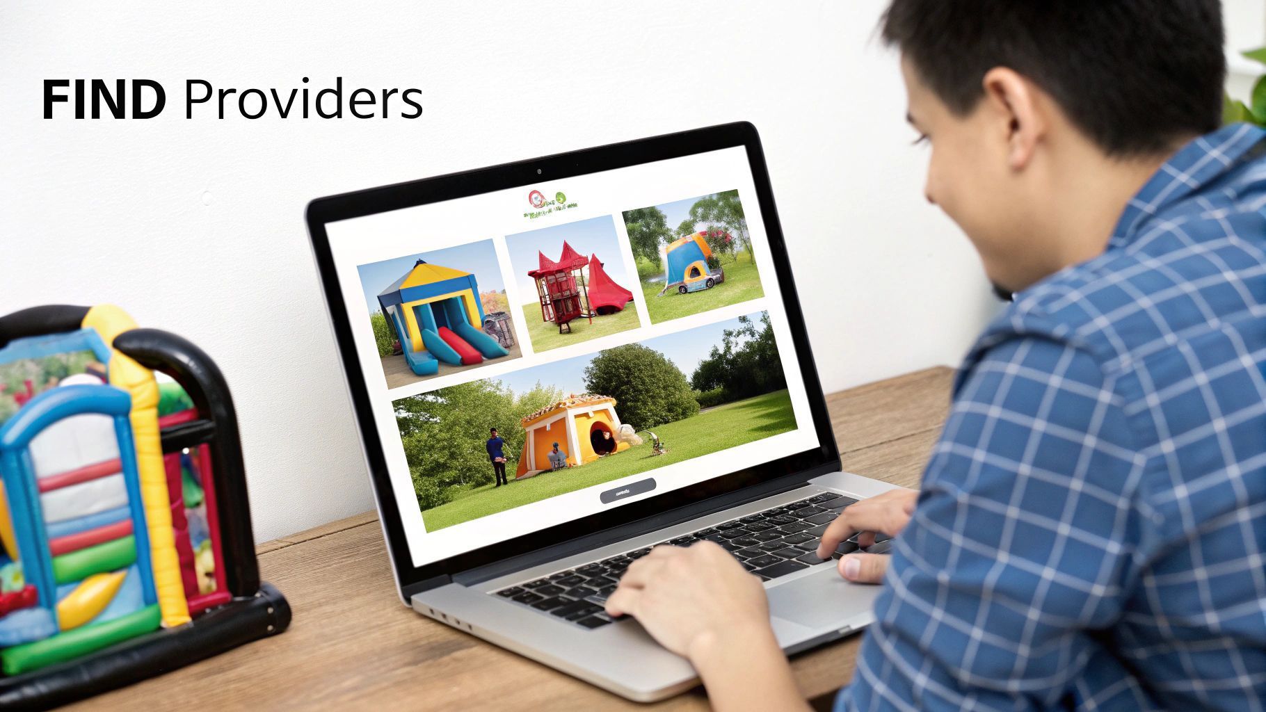 Person searching for bounce house providers on a laptop.