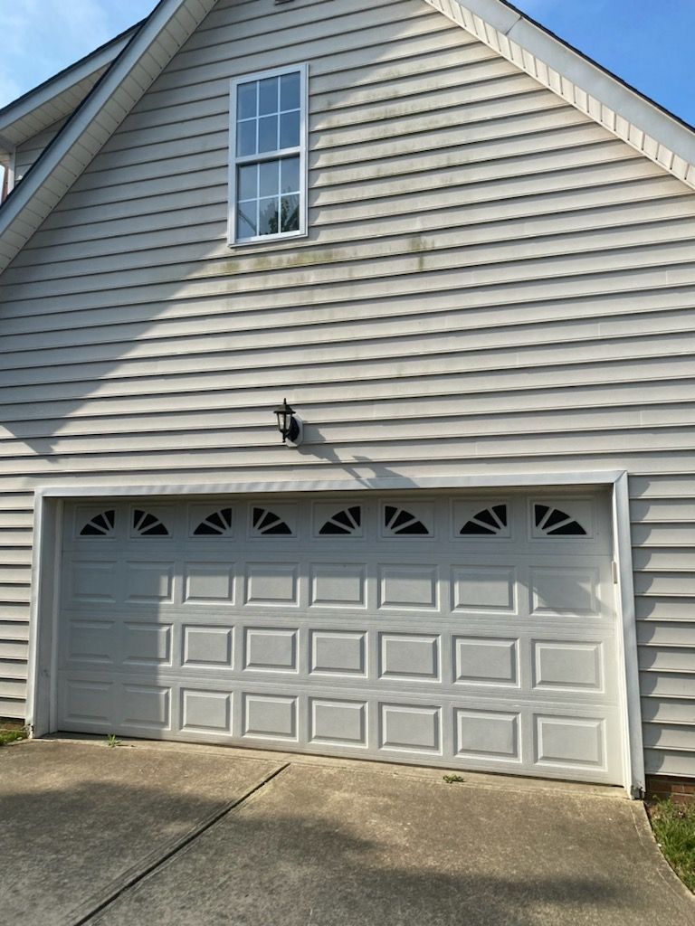 Gray house with garage door