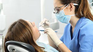 Root Canals — Dentist Checking the Teeth in Redding, CA