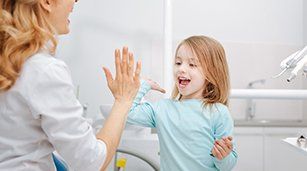 Cosmetic Dental Bonding — Child Goofing Around the Dentist in Redding, CA