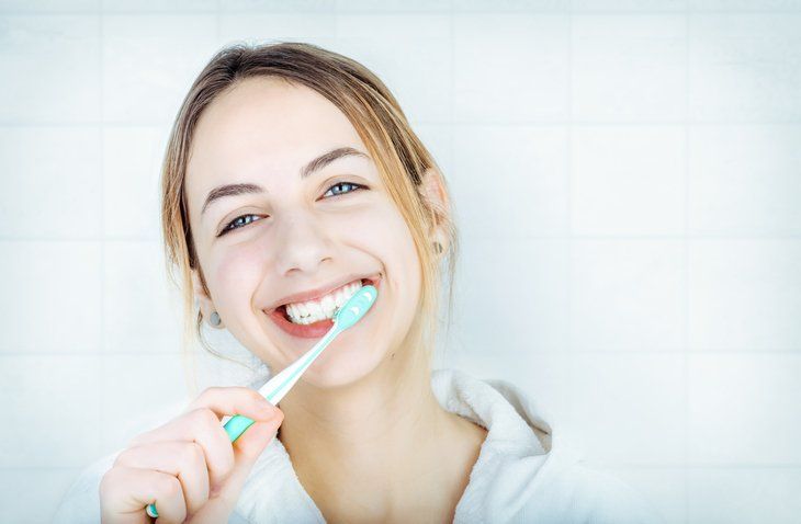 brushing teeth — Dental Facility in Redding, CA