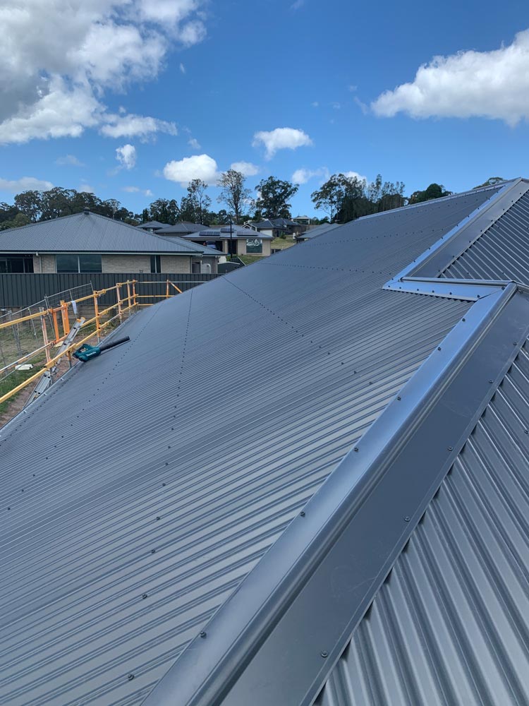 Installing New Metal Roof — Roofing And Guttering In Newcastle, NSW