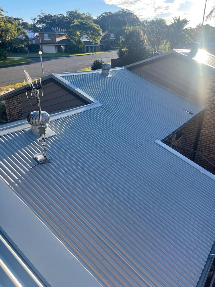 Home With Metal Roof — Roofing And Guttering In Newcastle, NSW