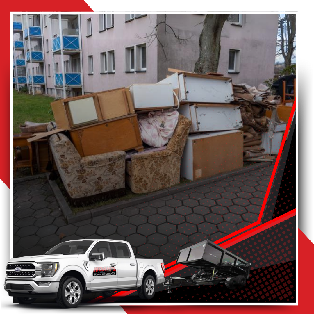 A pile of discarded furniture and house junk in front of a house.