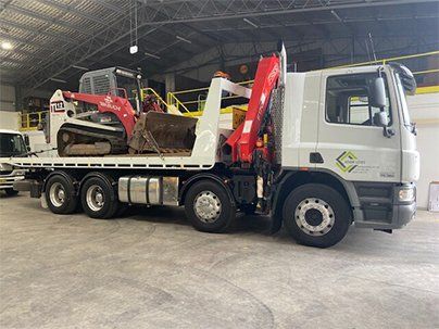 Earthmoving Truck with Excavator — Earthmoving & Excavation in Somersby, NSW
