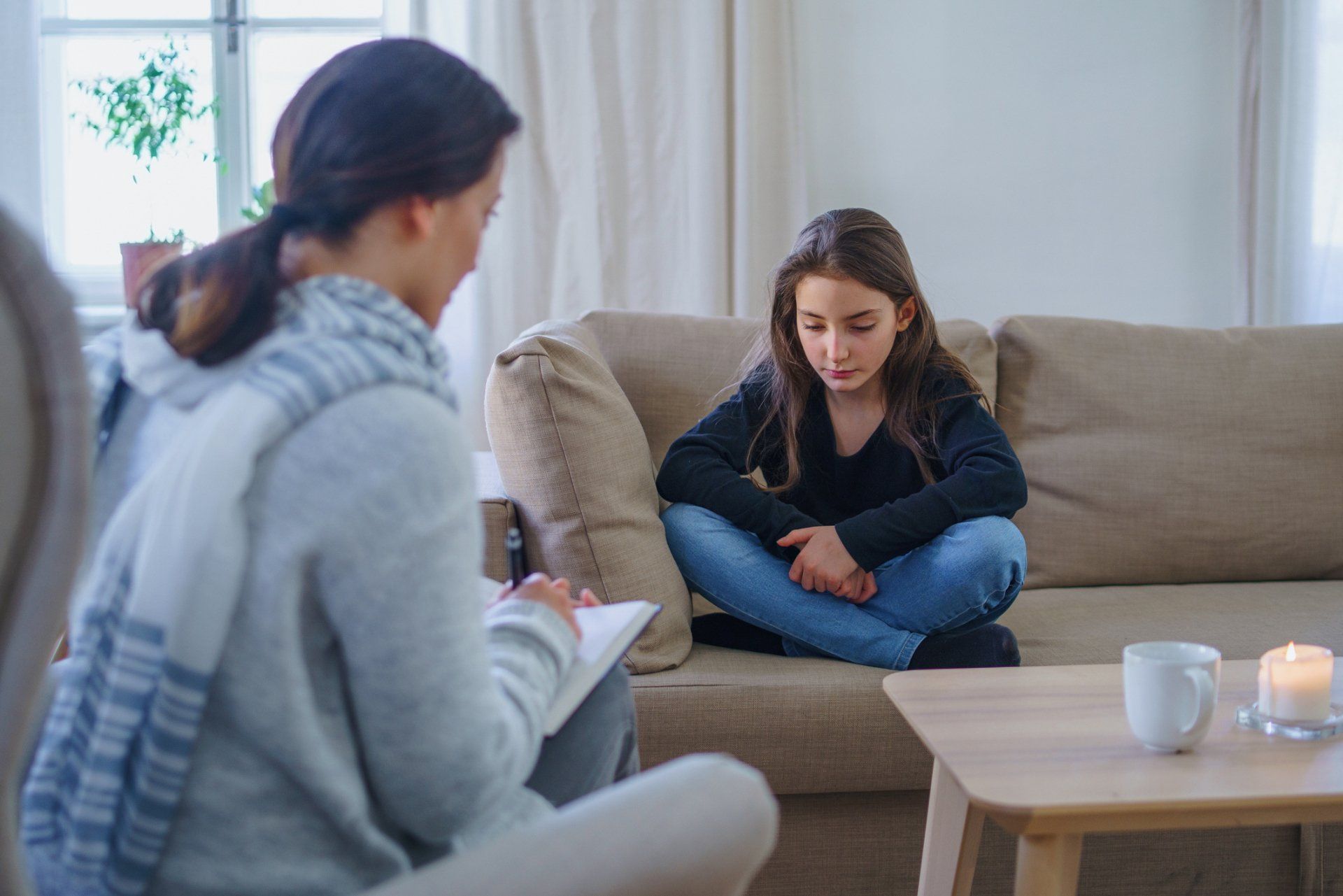 Depressed Small Girl with Therapist – Family & Marital Counseling Center, Inc