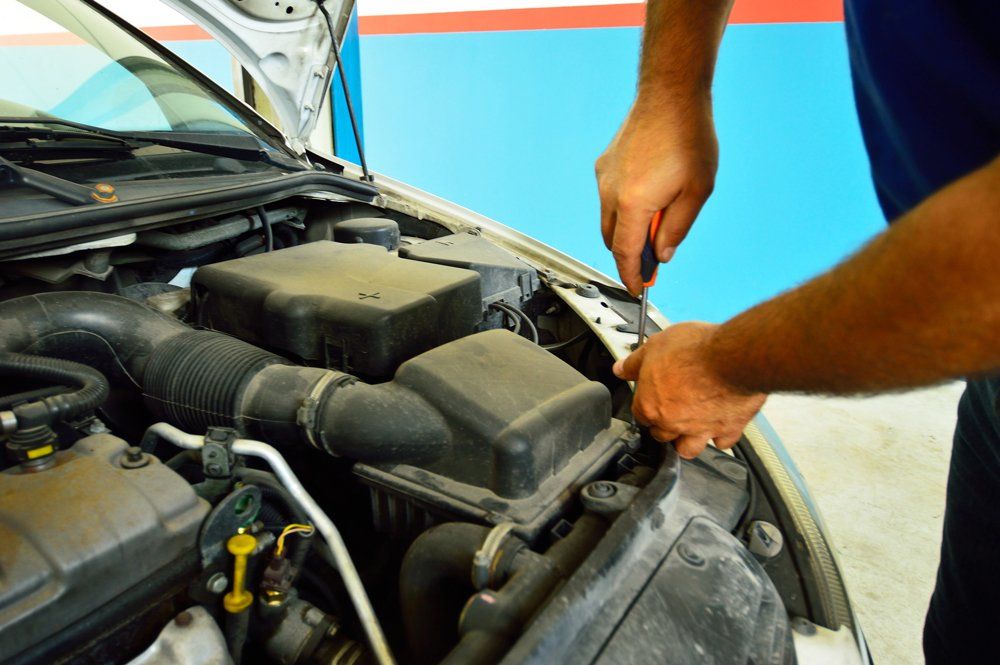 Mechanic Repairing a Car — Rockwall, TX — Rockwall Auto Repair