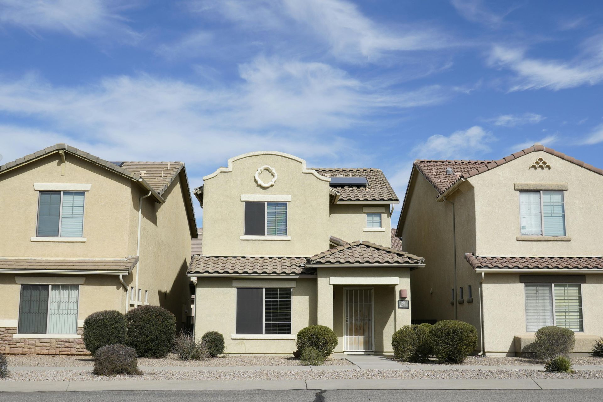 Beautifully painted residential homes by Green Valley Painters, showcasing professional exterior color work.